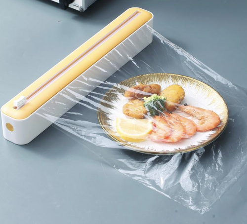 Настінний диспенсер Saran для харчової плівки та фольги, з різаком