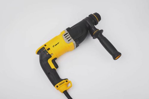 Професійний електроперфоратор у кейсі для свердління бетону та ударного буріння