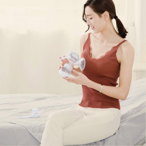 Ручний силіконовий молоковідсмоктувач портативний + пляшечка для годування і зберігання молока